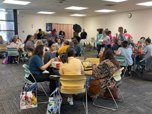 Ignite Conference Photo - Attendees eating lunch at round tables